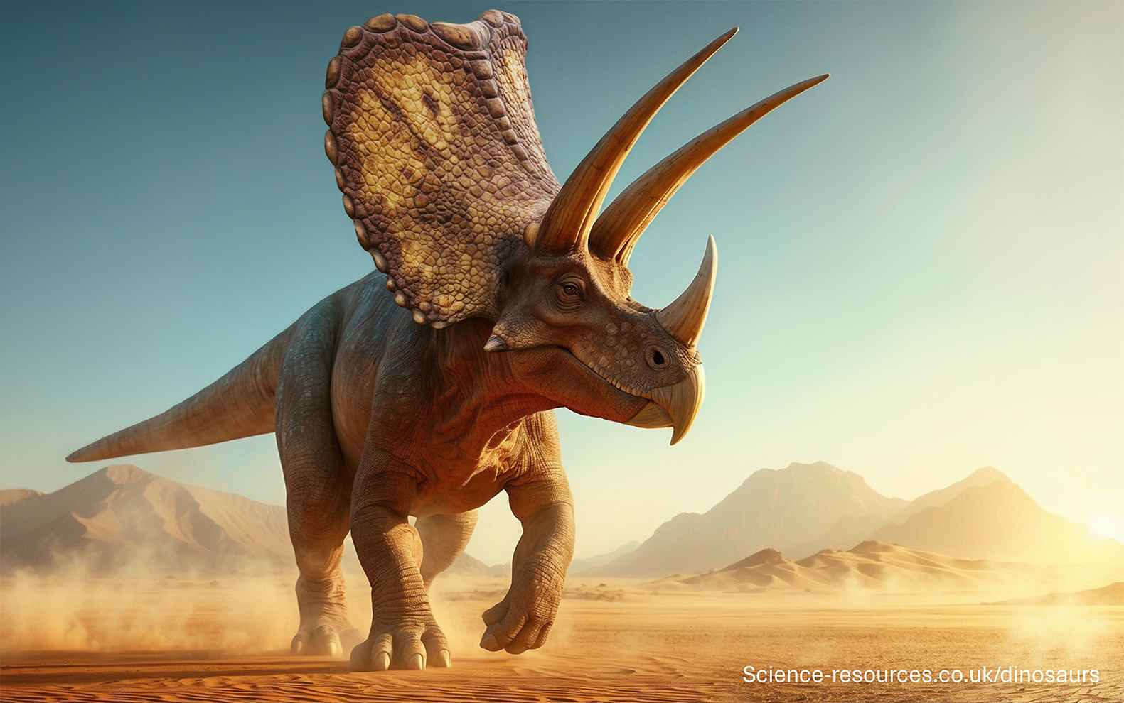 The image portrays a realistic rendering of a Torosaurus dinosaur in a desert landscape. The dinosaur features two large horns above its eyes and a smaller horn on its nose. It stands in an arid environment with sand and distant mountains under a clear sky.